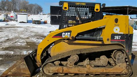 caterpillar 277a skid steer aux controls|cat 267 loader track adjustment.